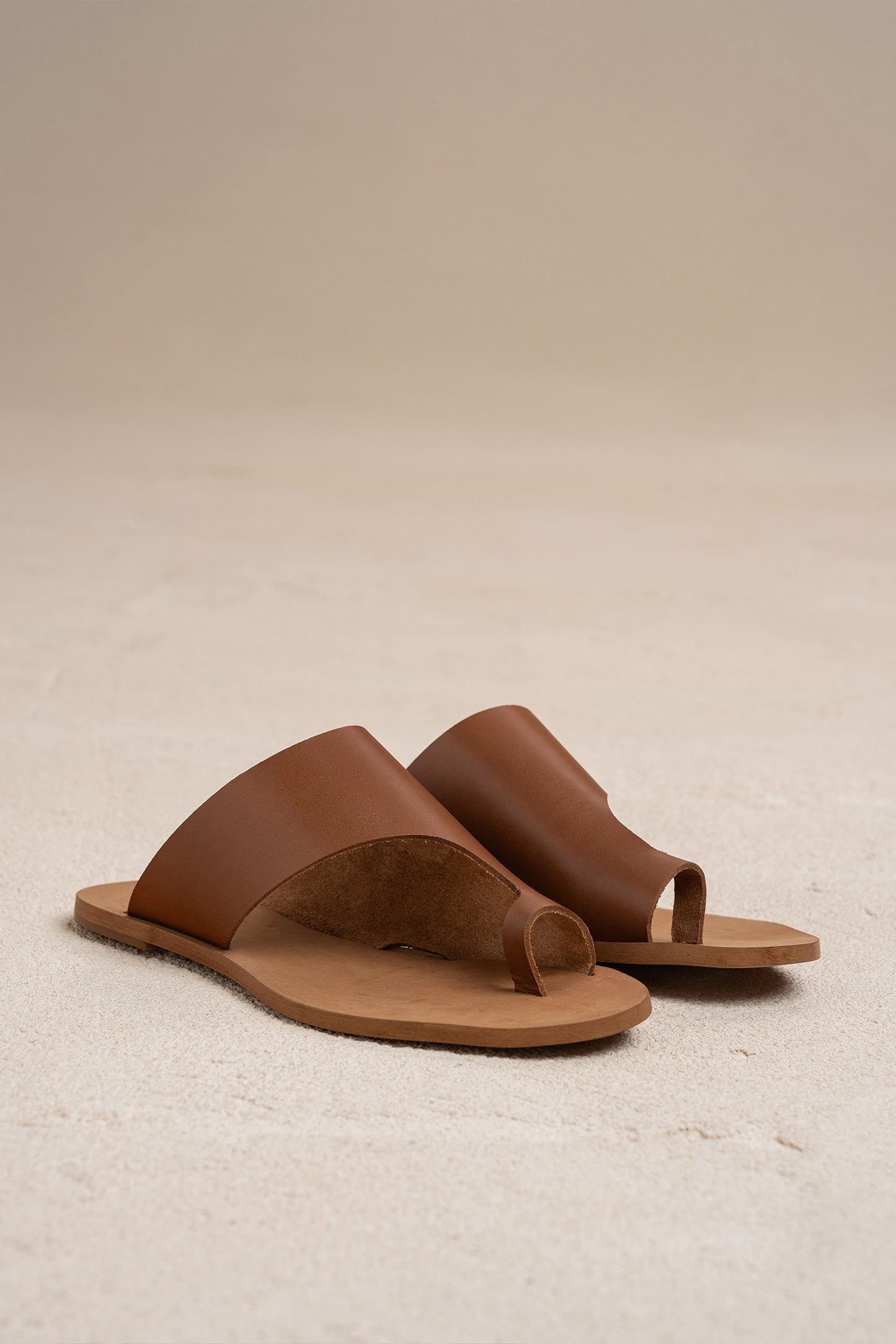 ASYMMETRIC LEATHER SANDALS