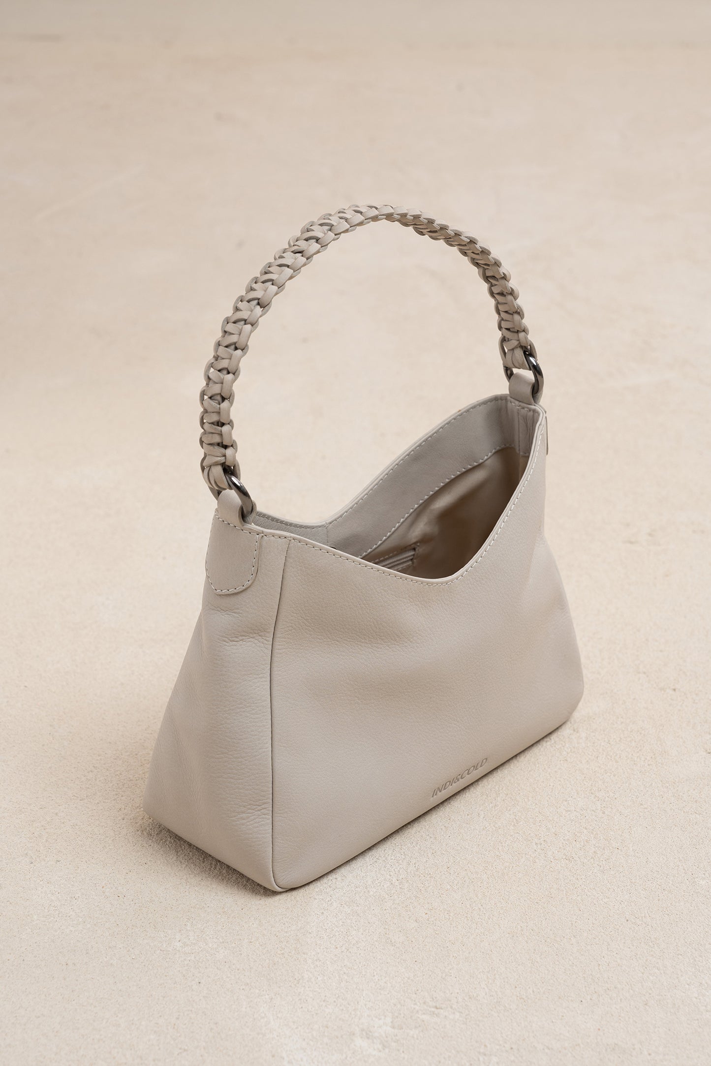 LEATHER BAG WITH BRAIDED HANDLE