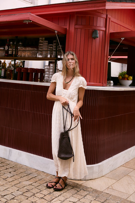BRAIDED-LEATHER BUCKET BAG 1