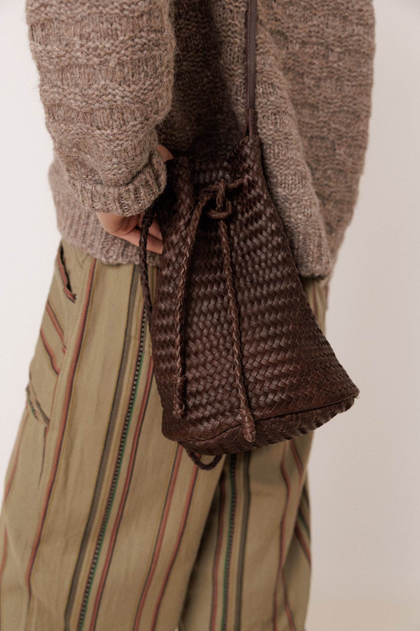 BRAIDED-LEATHER BUCKET BAG
