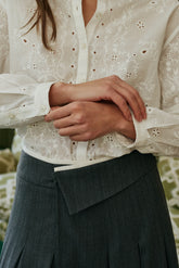PLEATED CROSSOVER SKIRT