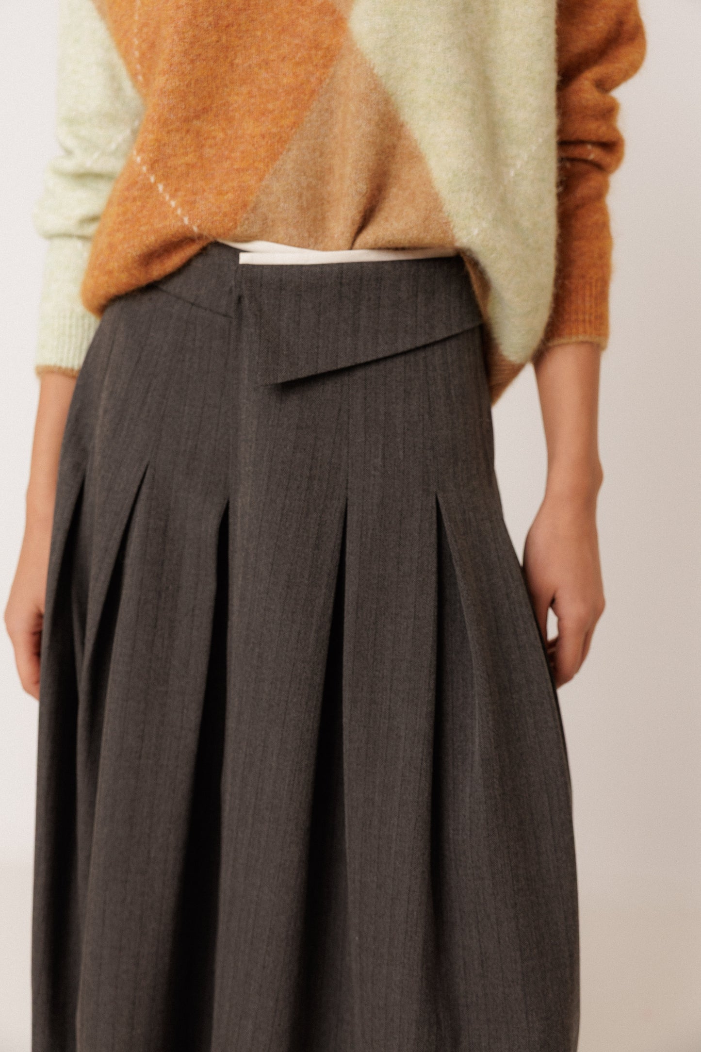 PLEATED CROSSOVER SKIRT
