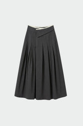 PLEATED CROSSOVER SKIRT