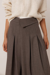 PLEATED CROSSOVER SKIRT